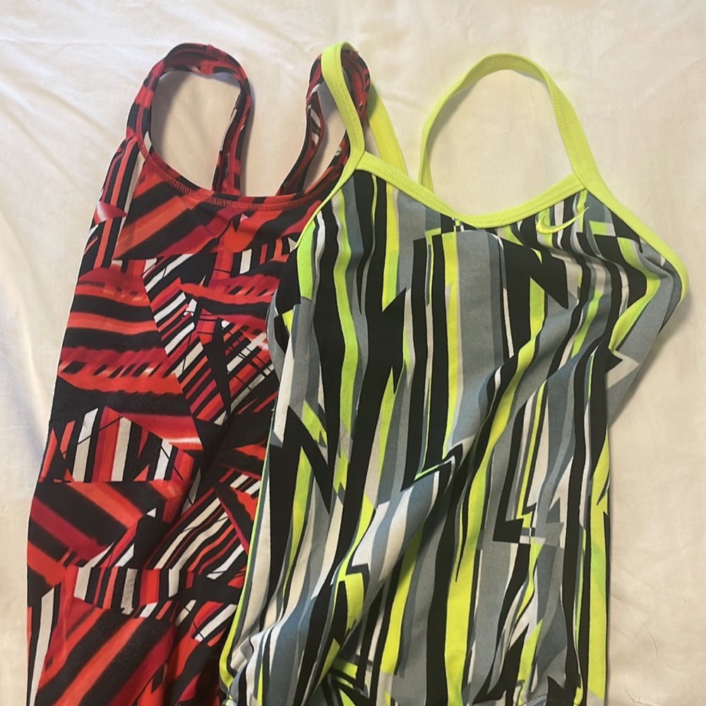 Two one piece bathing suits. Great for swim team practice